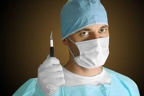 A surgeon performing an operation to enlarge the penis for medical reasons